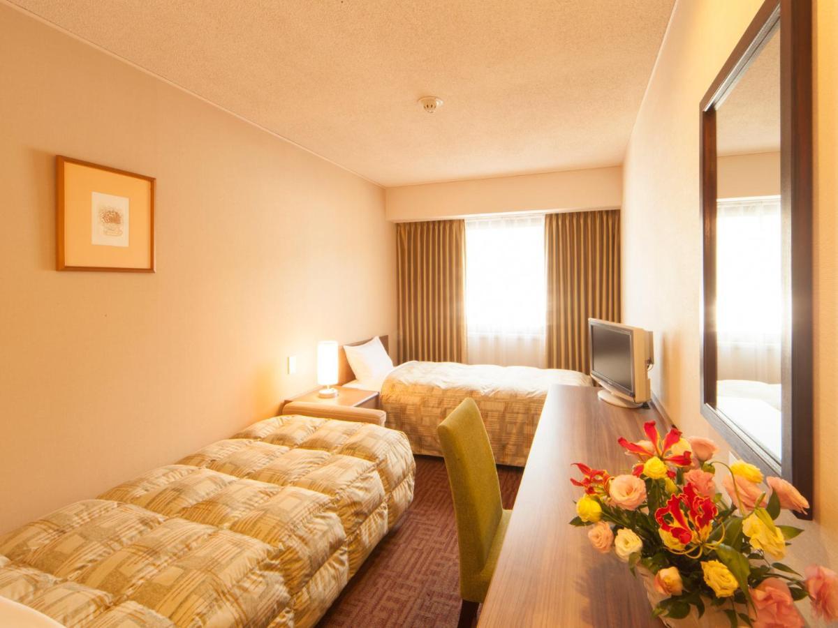 Hotel Pearl City Kesennuma Værelse billede