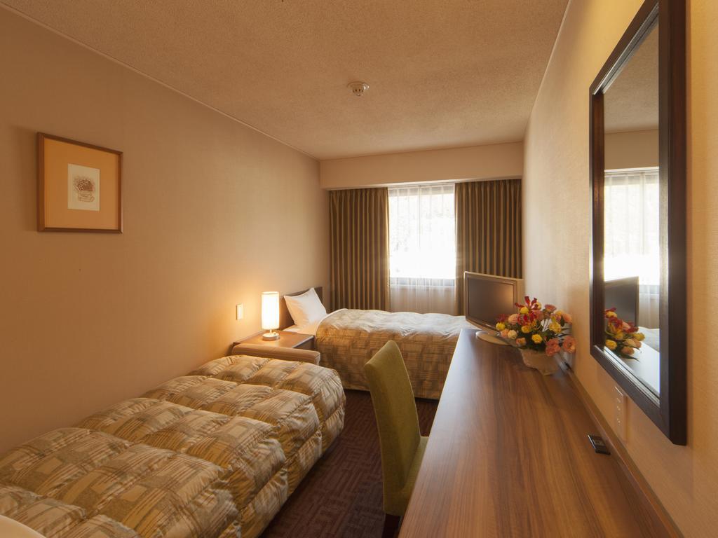 Hotel Pearl City Kesennuma Værelse billede